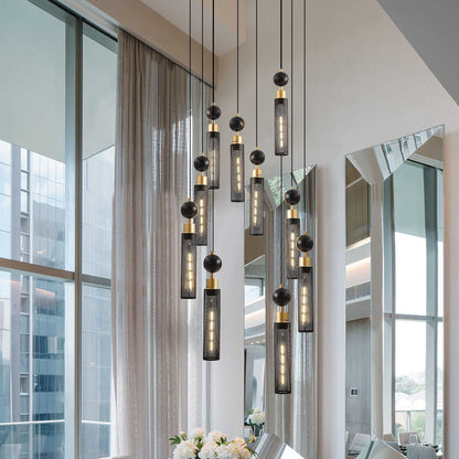 24" Modern Industrial Multi-Light Pendant Chandelier - 9-Light Black and Gold Adjustable Ceiling Light Fixture with Mesh Cylinder Shades for Living Room, Dining Room, or Staircase (Bulb Not Included) - luxuryhomedecoridea.com